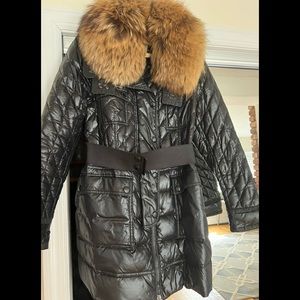 Monclear coat with a beautiful fur collar